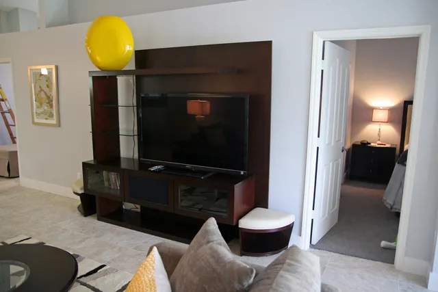 Large oversize flat screen TV & DVD in family room area
