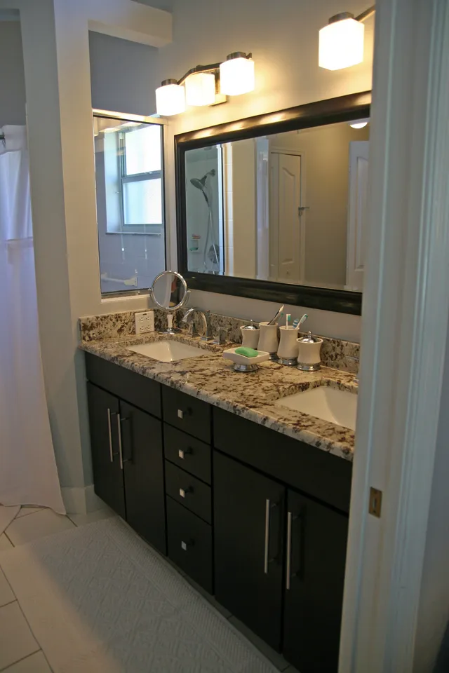 New master bath cabinets, granite and walk in closet with built in cabinets