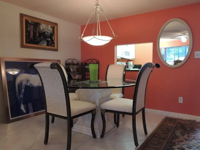 The dining area is adjacent to the kitchen