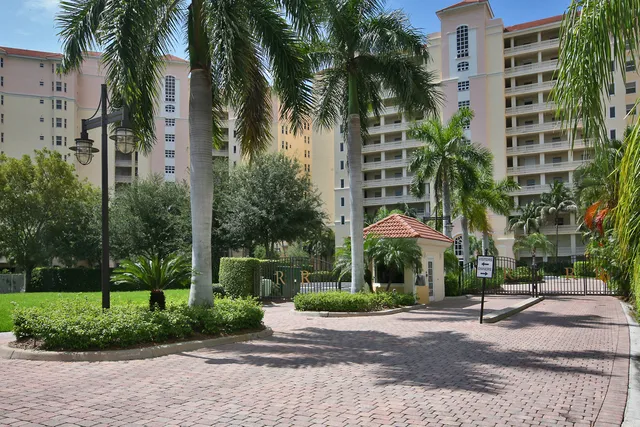 Nicely landscaped, security guardhouse.