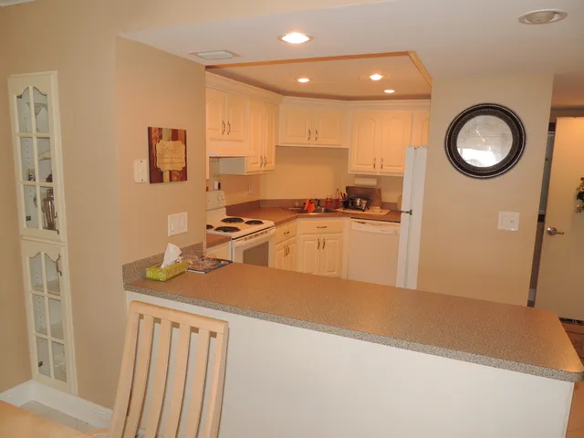 Kitchen is spacious with plenty of counter space and comes fully equipped