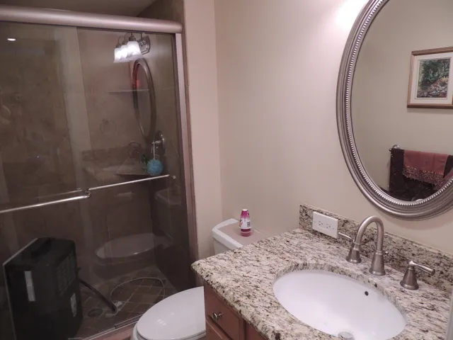 Master bath has been renovated with walk in shower and granite