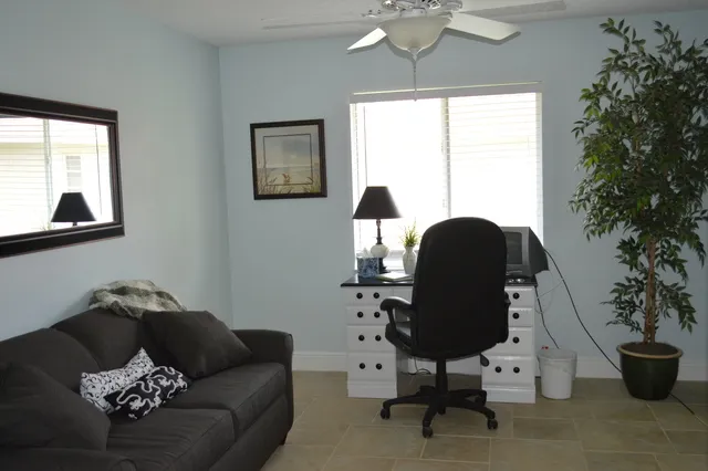 Comfortable Den/office with queen sleep sofa. 