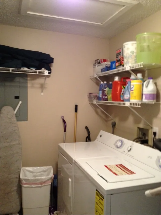 Laundry/utility room with washer/dryer and plenty of storage