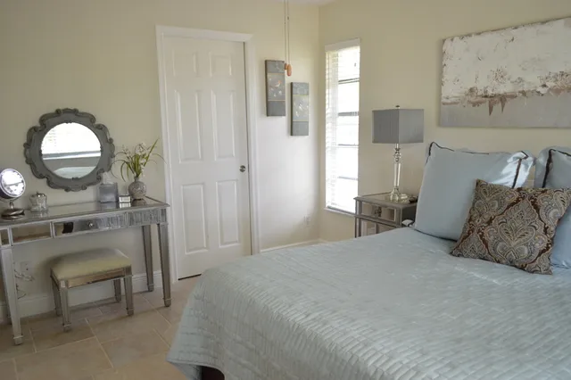 Master bedroom with private bath, walk-in closet and flat screen TV