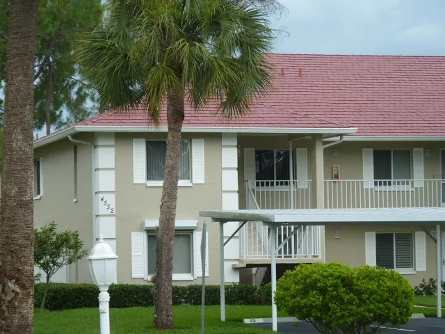2nd floor corner unit-cathedral ceilings, lots of windows and natural light