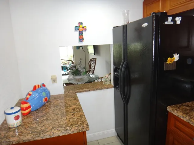pass through to dining area, kitchen view.