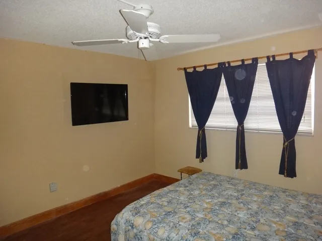 Master bedroom with flat screen tv