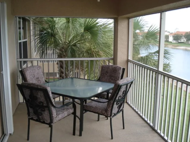 Lanai overlooking lake with fountain