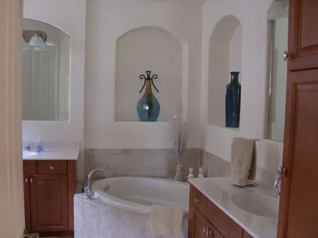 Master Bathroom Soaking Tub, His, & Her Vanities
