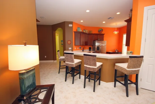 LEADING INTO DINING ROOM AND KITCHEN