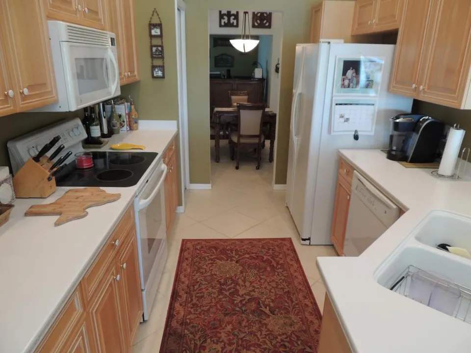 The kitchen is fully equipped and has high end appliances