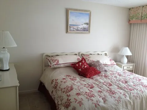 master bedroom with a king bed
