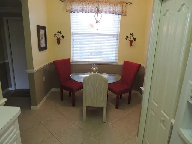 The breakfast nook features a dining table 