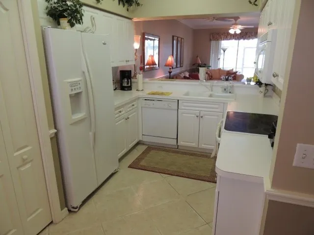 Spacious kitchen, updated appliances & open to the great room w/ views!