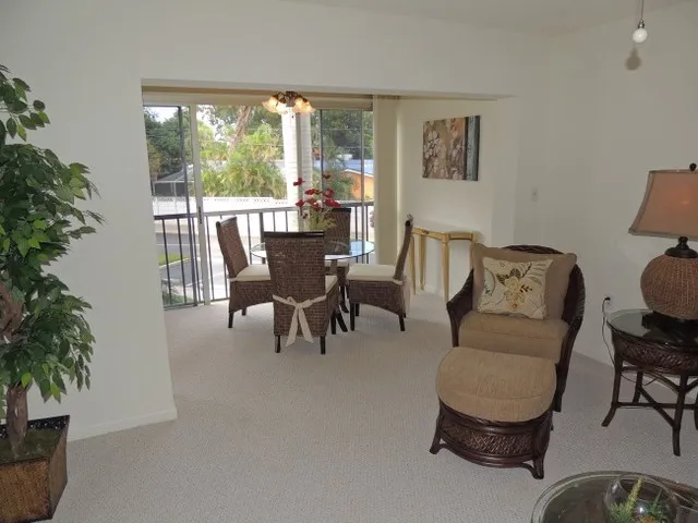 The rear of the condo is a wall of sliding glass doors - light & bright