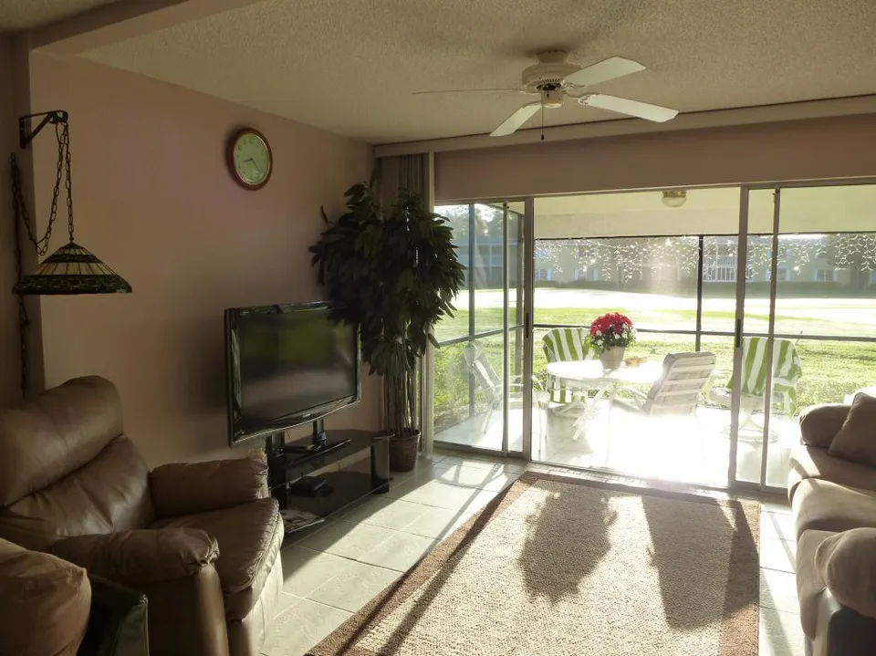 Flat screen and lazy boy in tv area.  