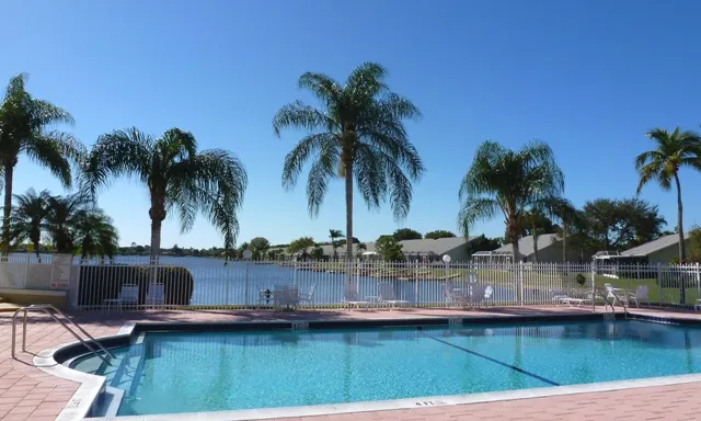 Heated swimming pool with plenty of lounge chairs