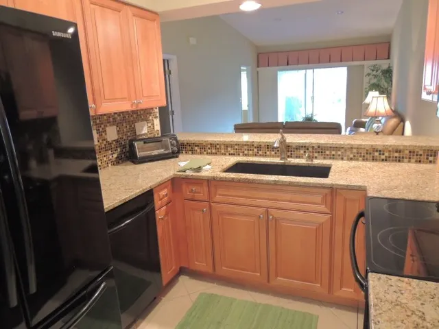 Updated kitchen with granite counter tops and is fully equipped 