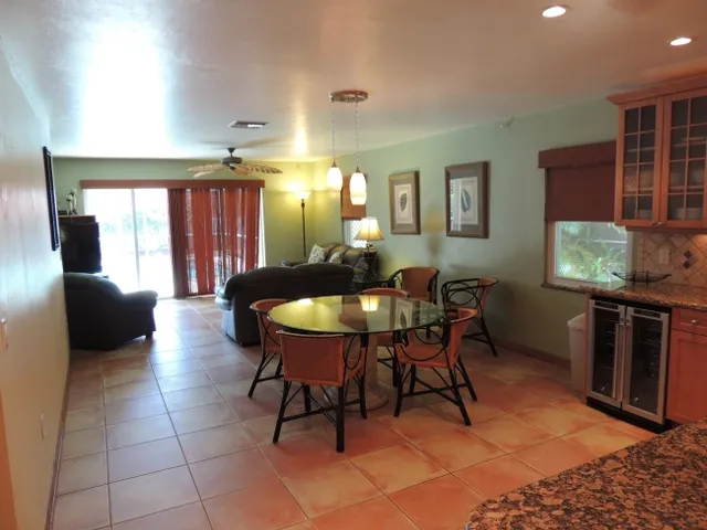 Spacious, open floor plan with recessed lighting throughout and tile floors
