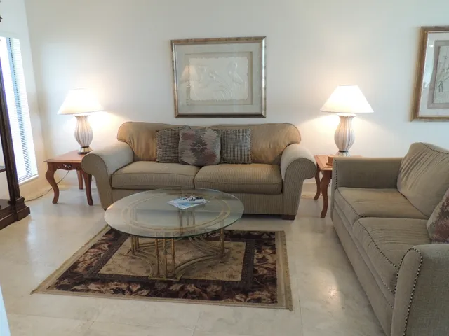 Living room with marble flooring throughout