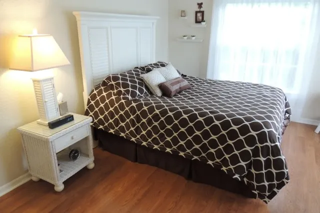 Master bedroom has hardwood floors