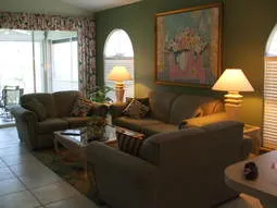 Living room has new rocker and reclining sofa and love seat