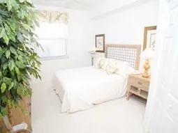 Queen bedroom with TV.