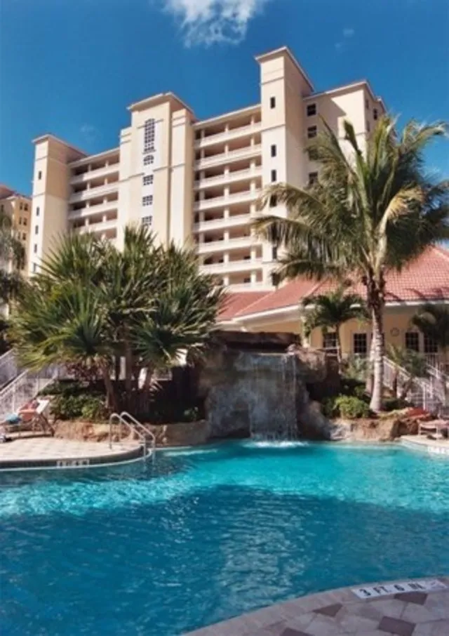 Waterfall pool and clubhouse adjacent to the building