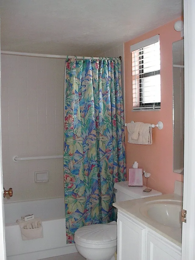 GUEST FULL BATH WITH GRAB BARS IN TUB/SHOWER AREA