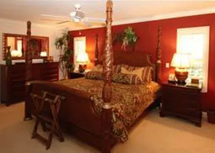 King size bed, comfortable, master suite with adjoining bath room.
