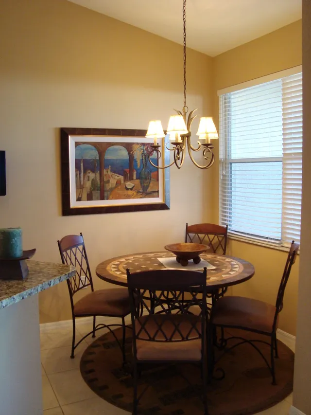 Dining area with wall mounted flat screen TV