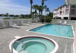 View of pool and spa right on the bay