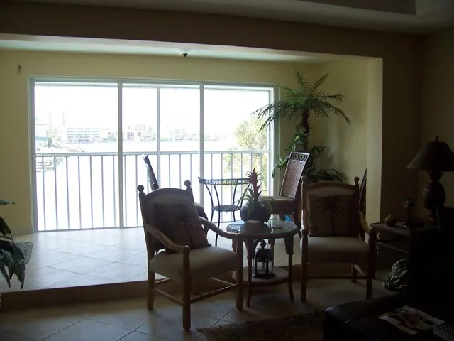 Lanai now part of condo with glass doors and screens does not include furni