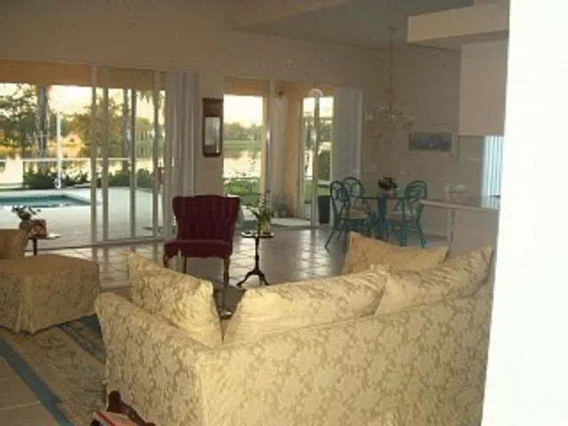 Great Room overlooks pool and lake