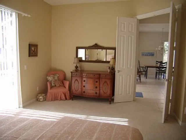 Master bedroom has a king size bed, walk in closet and his/hers bathroom