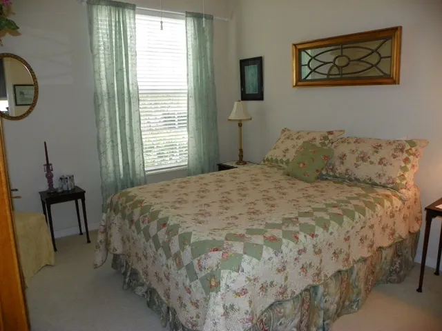 2nd bedroom, queen bed, large closet, bath across hall