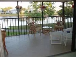 Unwind as you enjoy the view from your spacious waterfront lanai.