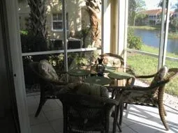 Lanai facing the lake and looking directly at a fountain.