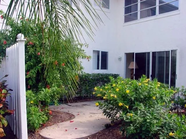 Private outdoor patio next to pool and Florida room.