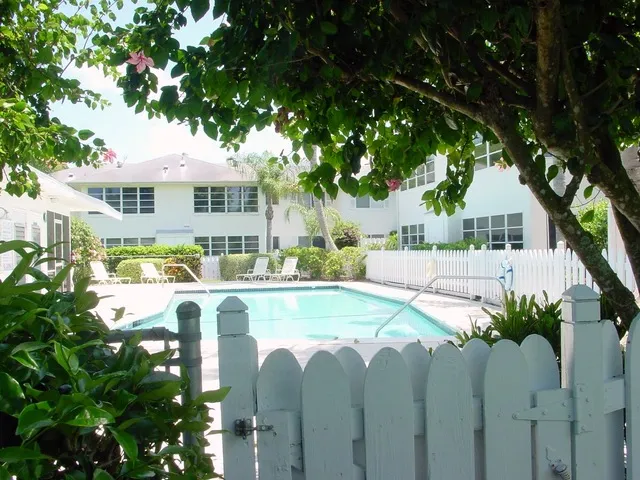 The pool right out back adjacent to your own patio.