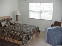 Large master bedrooom with his/her vanities & large walk-in closet
