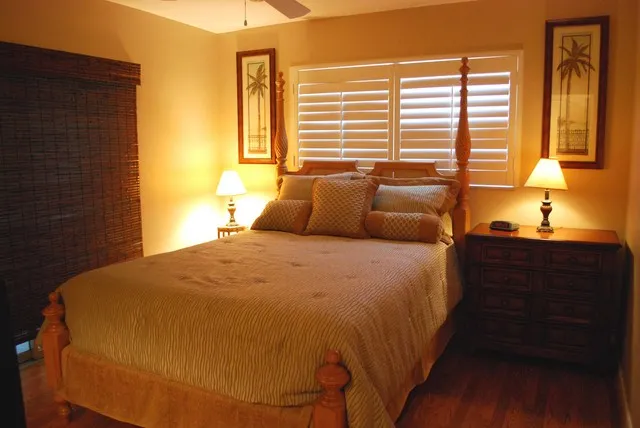 Guest Bedroom with Queen-sized bed. Guest bath is adjacent off same hall.