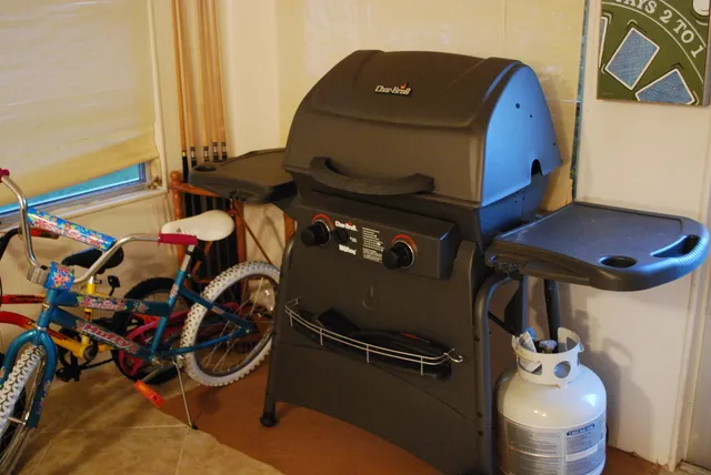 Gas Grill. Kids bikes and 2 adult cruisers.