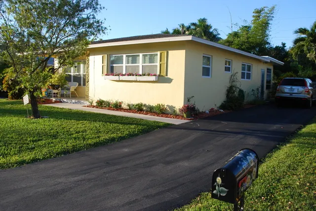 Plenty of off-street parking in the driveway for 3 cars or boat on trailer