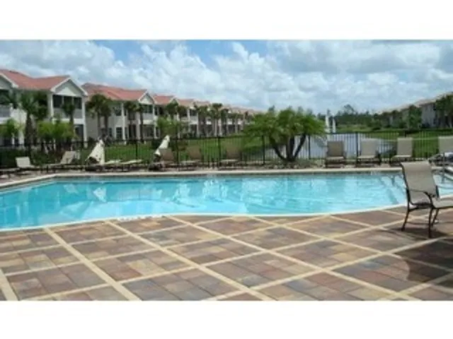CLUBHOUSE POOL WITH LAKE VIEW