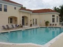 L'Ambiance of Pelican Bay Clubhouse and Pool walk Community Ctr and shoppin