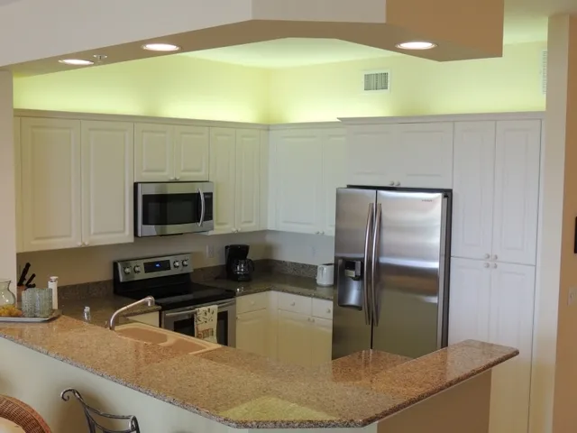 Kitchen features new stainless steel appliances & granite counter top