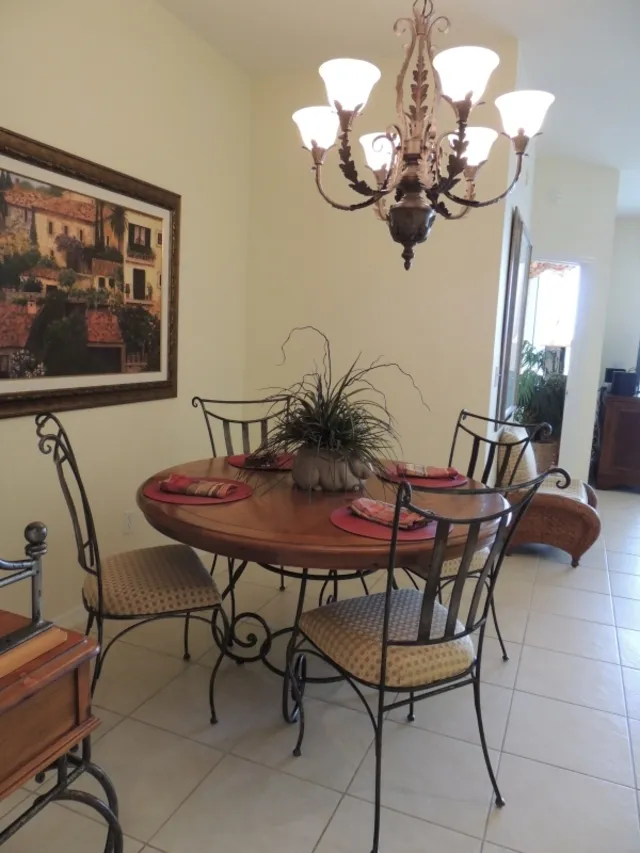 Dining room features seating for 6 - notice the decorating details!