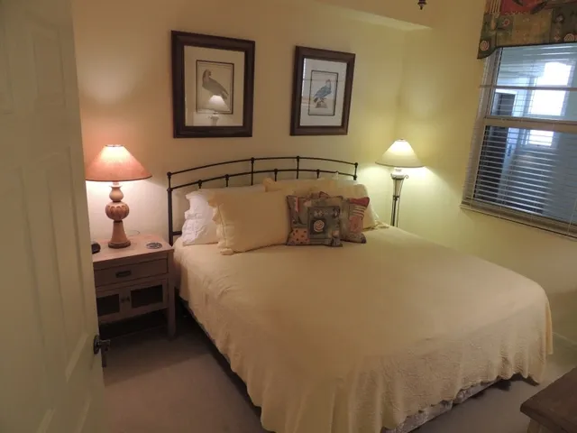 2nd guest room has a king bed with flat screen tv-guest rooms share a bath